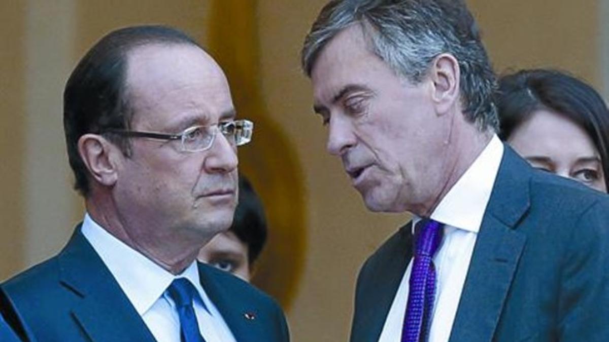 Jerôme Cahuzac (a la derecha) junto al presidente francés, François Hollande, el pasado día 4, en el Elíseo.