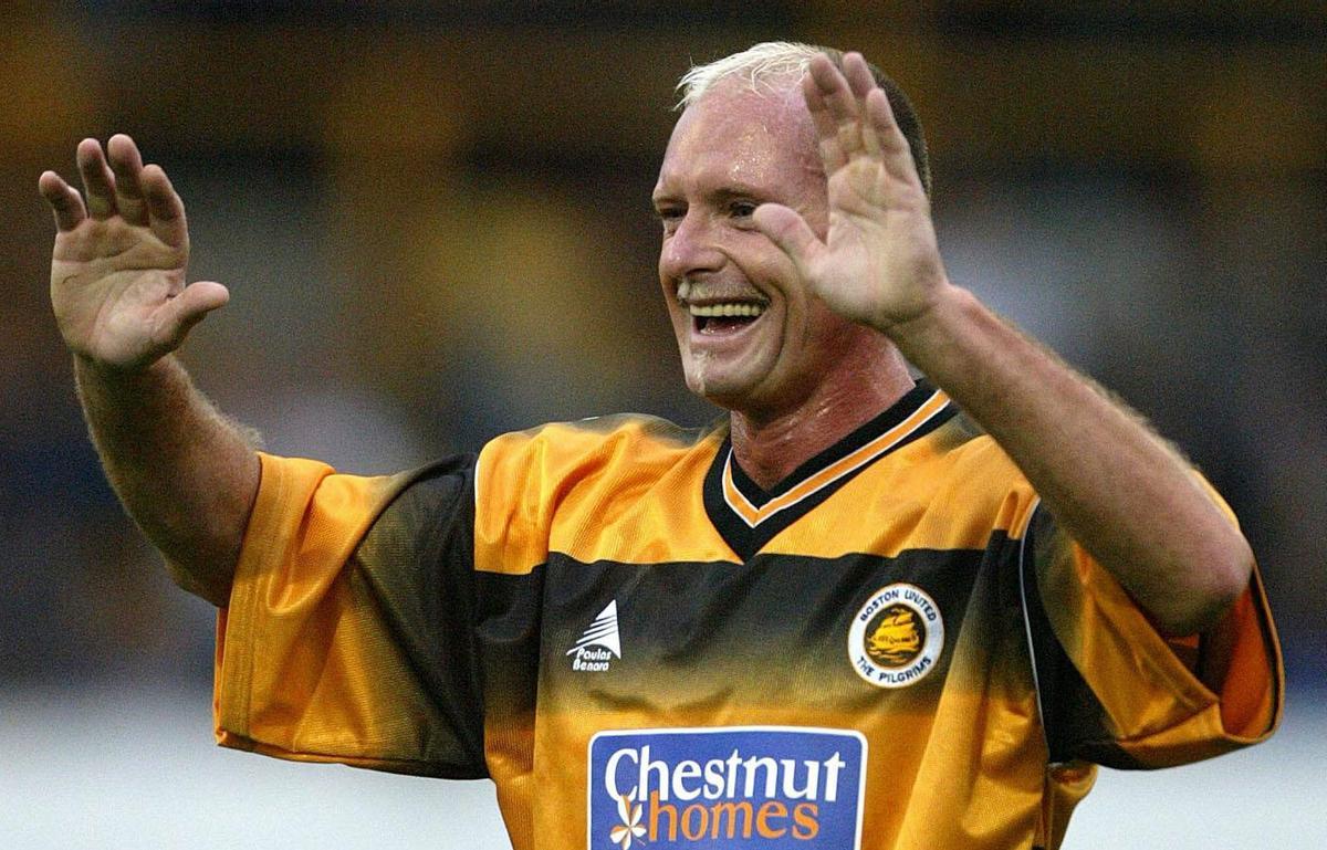 Former England soccer international Paul Gascoigne, reacts after his team scored in a friendly match against Newcastle United, at York Street stadium in Boston, England, Tuesday July 27, 2004. Gascoigne, who played for England 57 times, as well as clubs in Italy, Scotland and China in a career troubled by drinking, has been named player-coach at Boston United, a third division club.(AP Photo/Nick Potts-pa) ** UNITED KINGDOM OUT: MAGS OUT: NO SALE: **