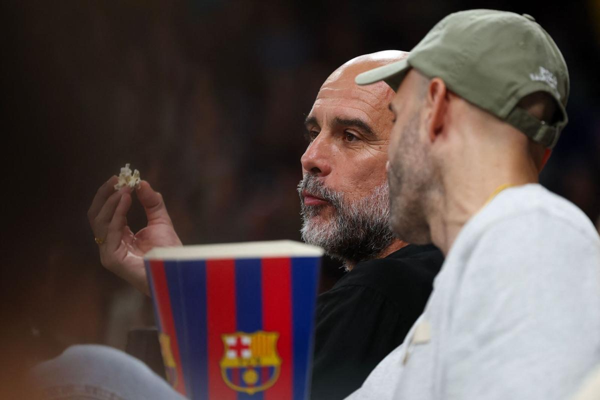 Former Manchester City manager Pep Guardiola attends the EuroLeague basketball day 6 match between FC Barcelona and Olympiacos Pireus at the Palau Blaugrana arena in Barcelona on October 16, 2026. (Photo by Lluis GENE / AFP)