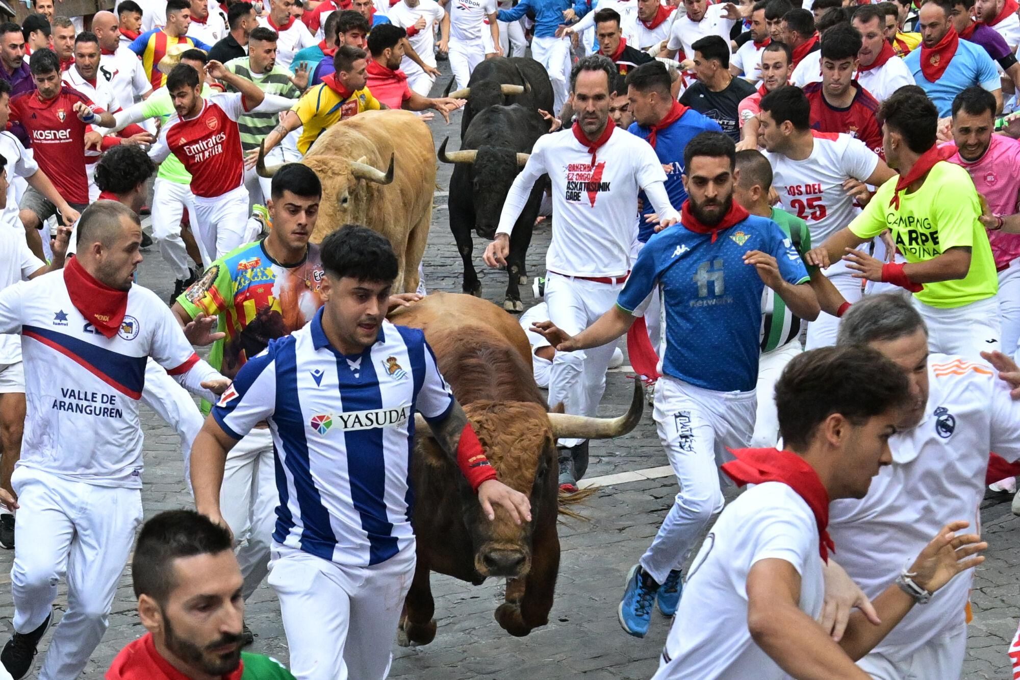El quinto encierro de los Sanfermines 2025, en imágenes.