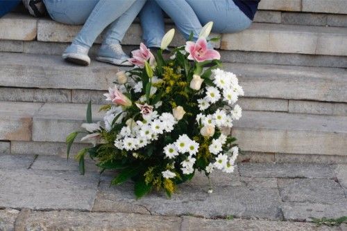 Ofrenda floral de los equipos de la UCAM en la Fuensanta