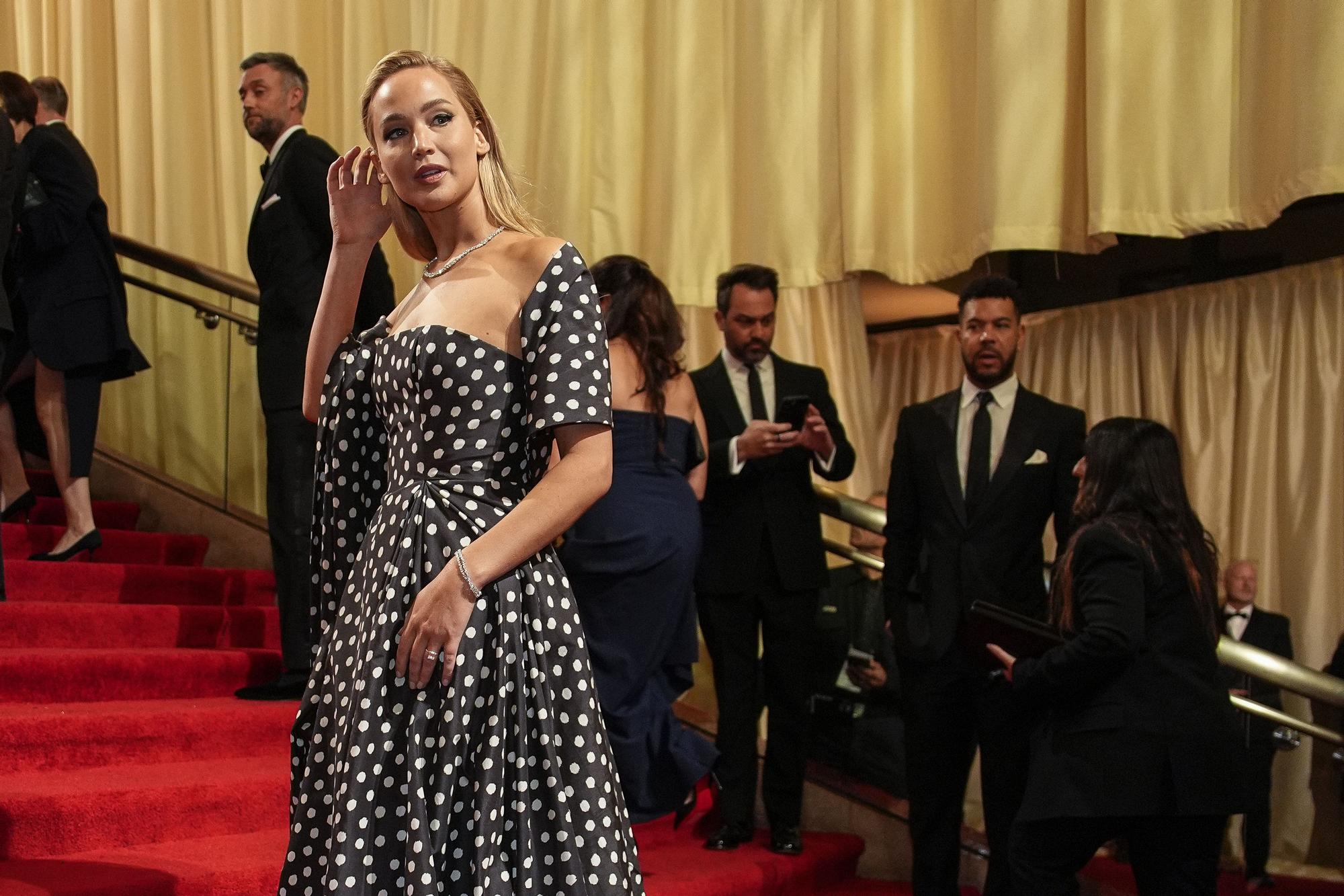 Jennifer Lawrence arrives at the Oscars on Sunday, March 10, 2024, at the Dolby Theatre in Los Angeles. (AP Photo/John Locher) / 31024130150