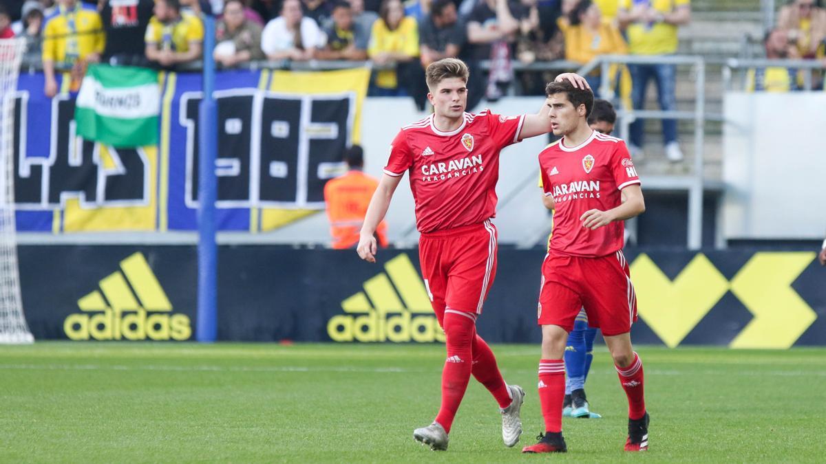 Soro y Guti, dos de los jugadores del Zaragoza traspasados, en un partido con la elástica blanquilla.