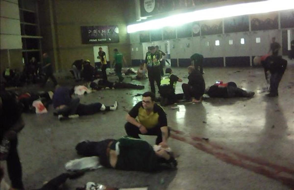 dcaminal38564796 helpers attend to injured people inside the manchester arena170523110904