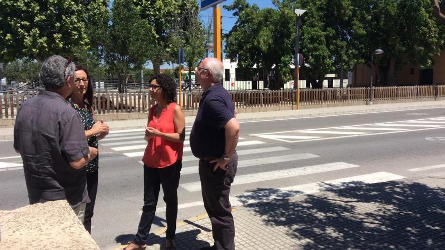 Val, Amigó, Martín y Císcar en uno de los pasos de peatones de la estación de Metro