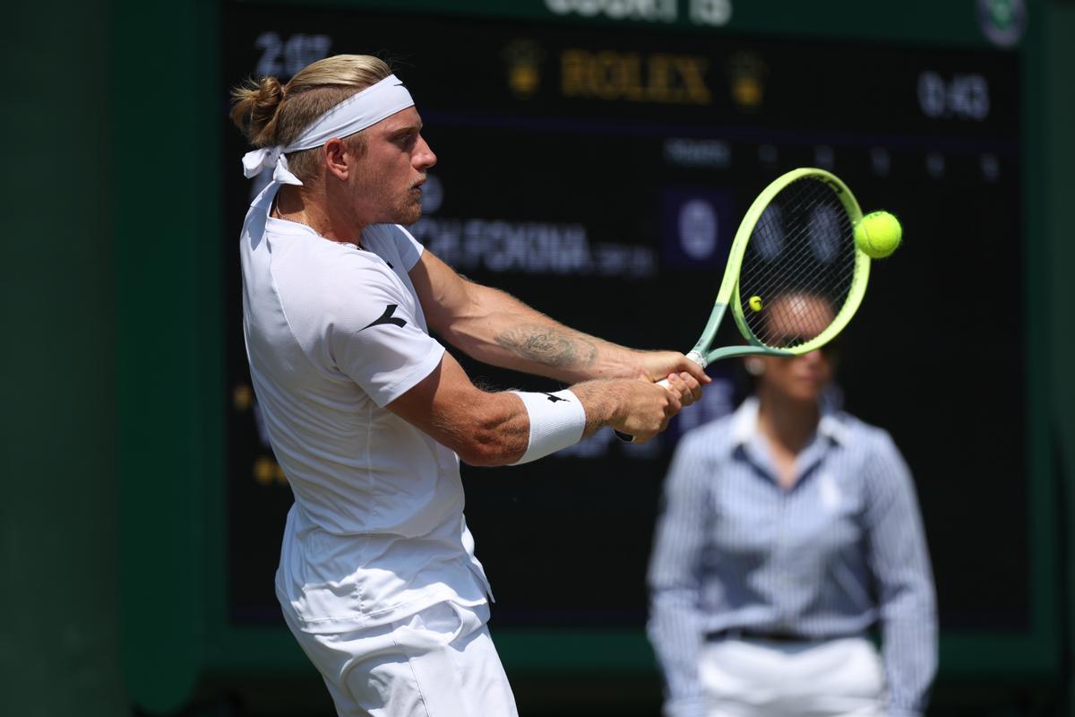 Alejandro Davidovich Fokina in action during his match against Botic van de Zandschulp at the Wimbledon Championships
