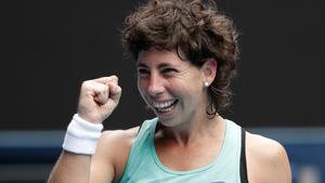 Spain’s Carla Suarez Navarro celebrates after defeating Anett Kontaveit of Estonia in their fourth round match at the Australian Open tennis championships in Melbourne, Australia Sunday, Jan. 21, 2018. (AP Photo/Vincent Thian)