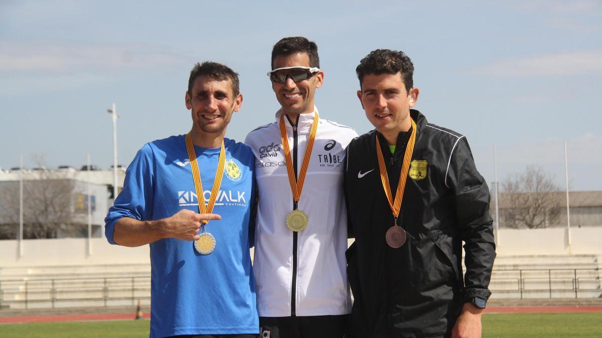 García Pujadas, Mola y Planells posan con sus medallas