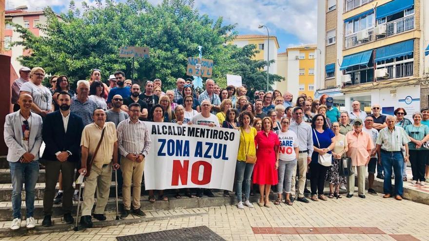 La protesta de los vecinos de Cruz de Humilladero contra la zona azul