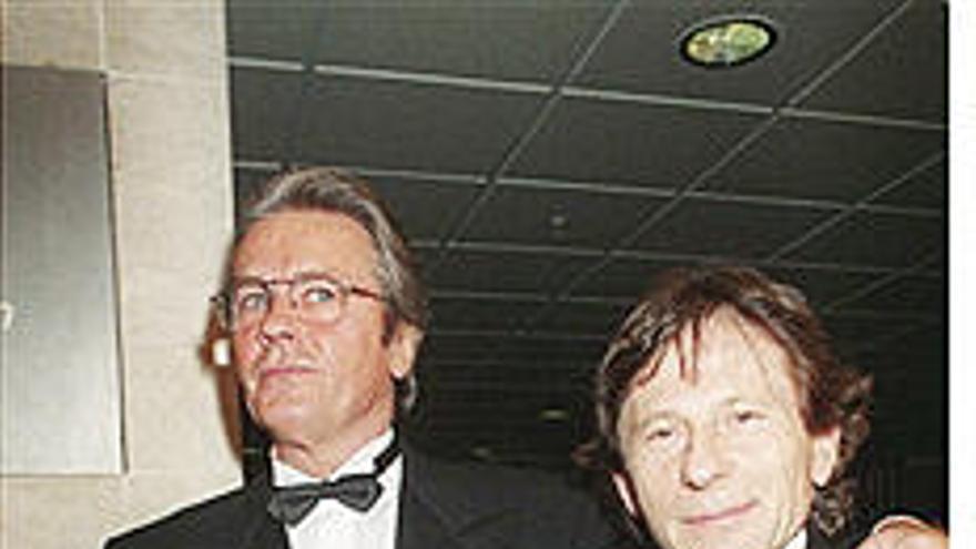 Delon con Polanski, en 1997.