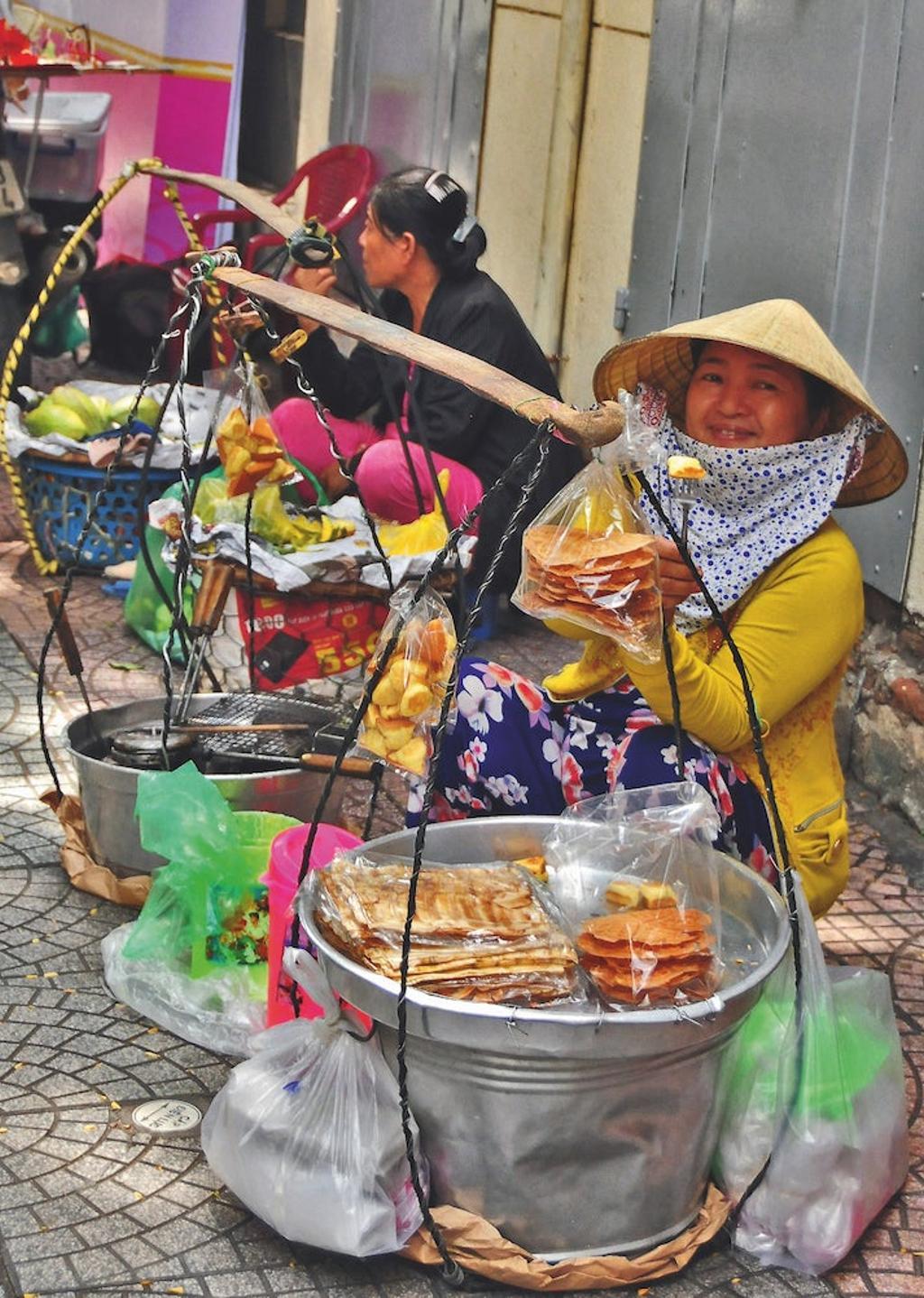 Puestos callejeros de comida en Hué.