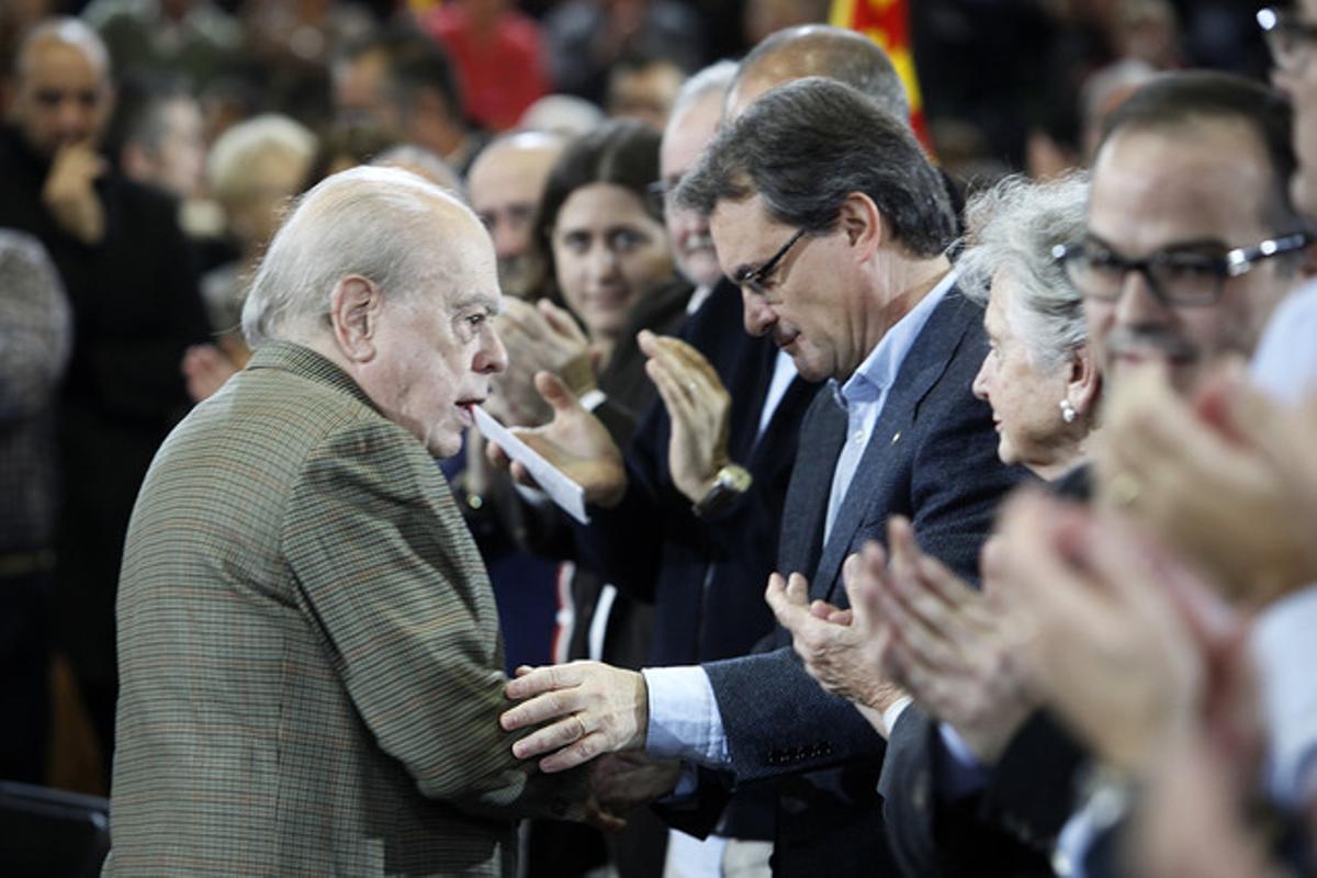 Jordi Pujol i Artur Mas, observats per Marta Ferrusola, dissabte en el míting de CiU a Granollers.