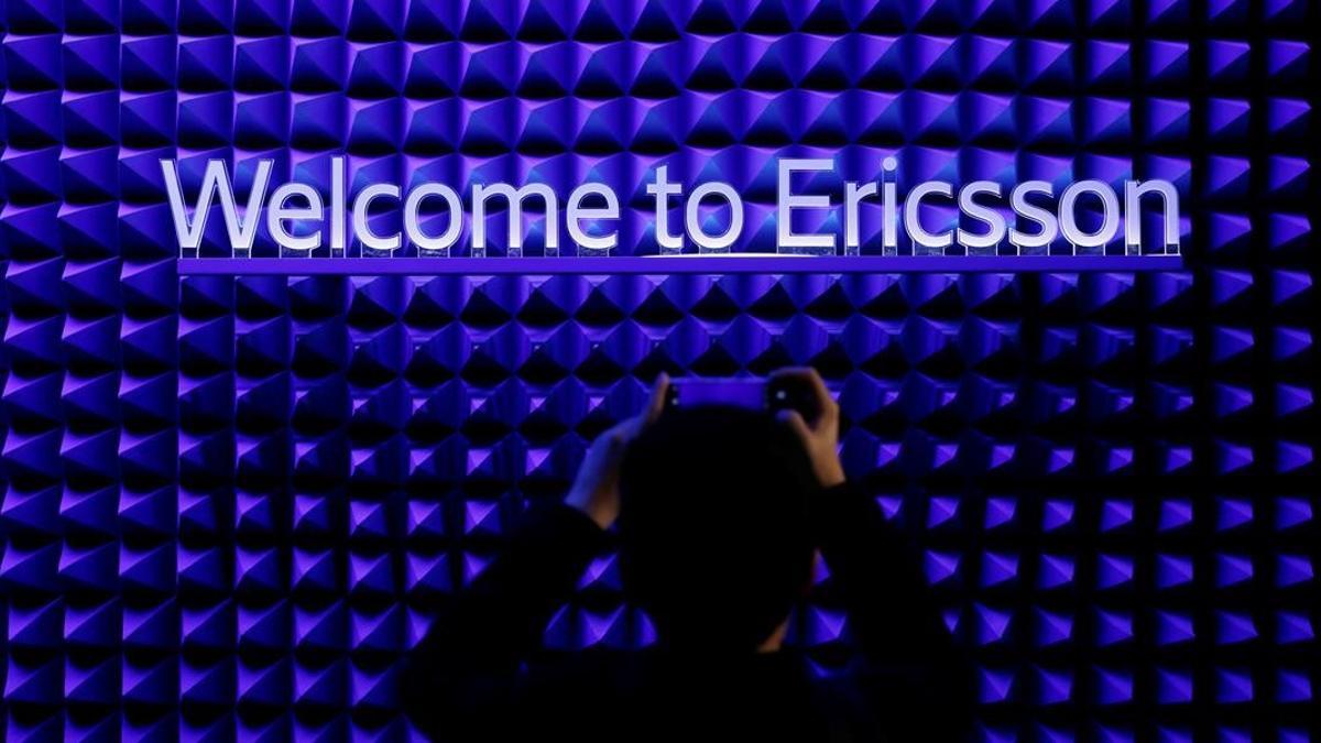 A visitor takes a picture with his mobile phone in front of the Ericsson booth at the Mobile World Congress in Barcelona  Spain February 25  2019  REUTERS Rafael Marchante