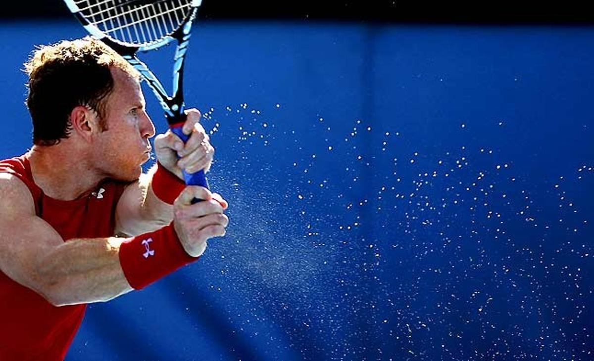 Fotografia del nord-americà Michael Russell durant un partit de segona ronda contra David Ferrer a l’Open d’Austràlia, a Melbourne.