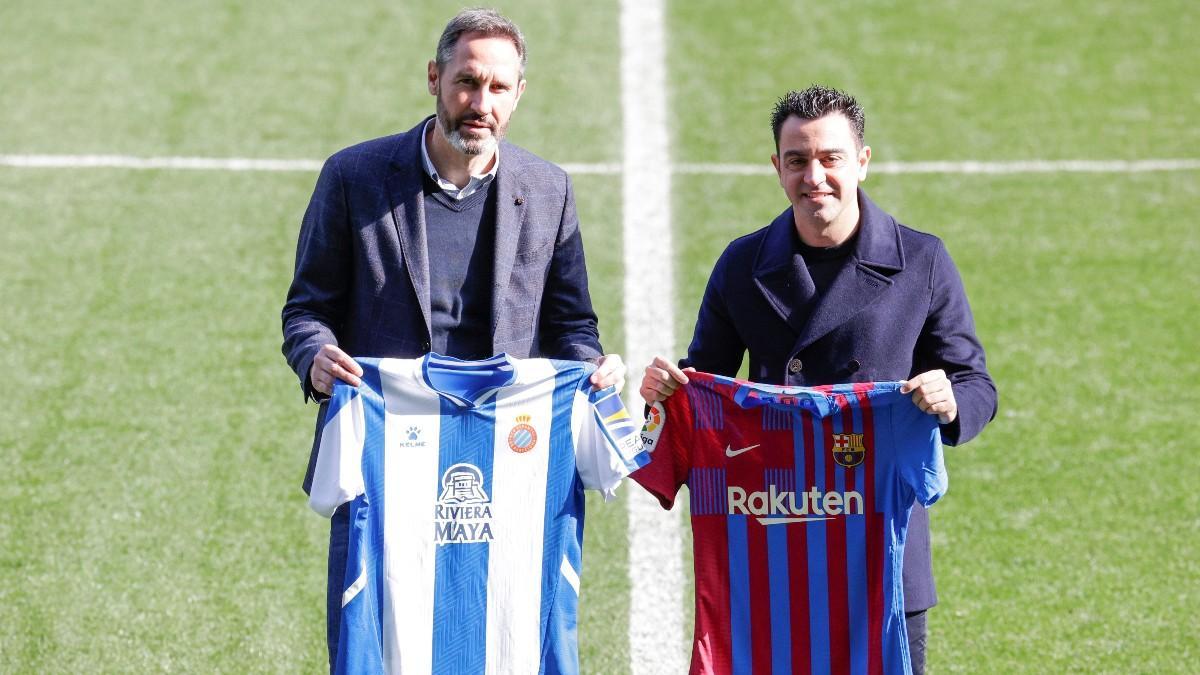 Vicente Moreno y Xavi antes del derbi