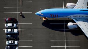 FILE PHOTO: A grounded TUI Airways Boeing 737 MAX aircraft is seen parked at a Boeing employee parking lot in an aerial photo at Boeing Field in Seattle, Washington, U.S. July 1, 2019. Picture taken July 1, 2019.  REUTERS/Lindsey Wasson/File Photo