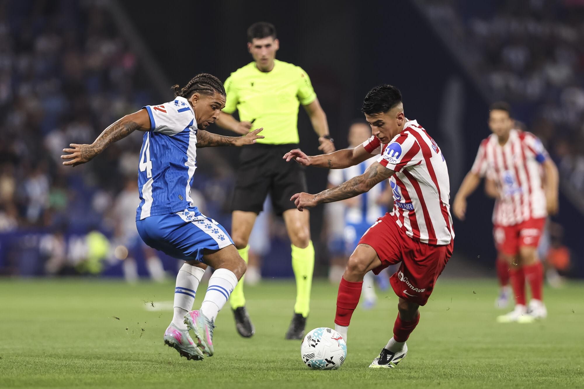 Thiago Almada of Atletico de Madrid and Tyrhys Dolan of RCD Espanyol in action during the Spanish league, La Liga EA Sports, football match played between RCD Espanyol and Atletico de Madrid at RCDE Stadium on August 17, 2025 in Cornella, Barcelona, Spain. AFP7 17/08/2025 ONLY FOR USE IN SPAIN. Javier Borrego / AFP7 / Europa Press;2025;SPORT;ZSPORT;SOCCER;ZSOCCER;RCD Espanyol v Atletico de Madrid - La Liga EA Sports;