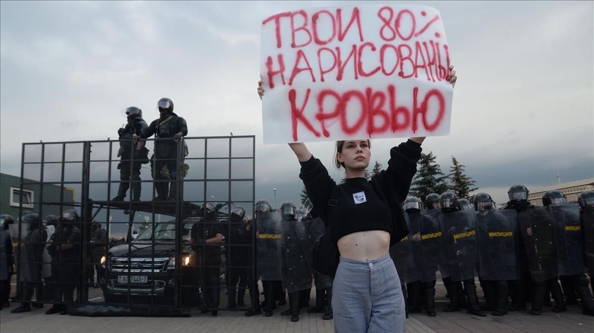 zentauroepp54706782 minsk  balarus   30 08 2020   a woman holds a poster  your 8200904203845