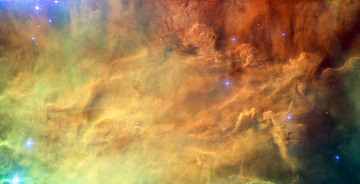 Las olas de gas y polvo en la Nebulosa de la Laguna fotografiada por el telescopio Hubble en 2010.