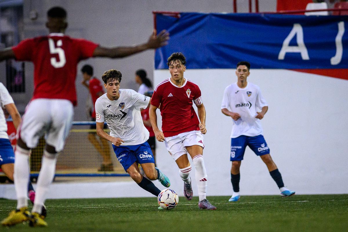 Lance del partido entre el Alzira y el Murcia.