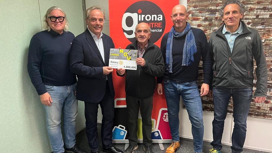 Donació de la cursa popular del Carrer Nou al Rotary Club de Girona