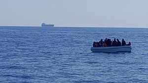 Archivo - Patera con 18 personas rescatada en aguas de Almería por Salvamento Marítimo.
