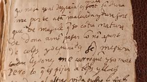 Poema manuscrito en la contraportada de un libro de poesía lírica griega.