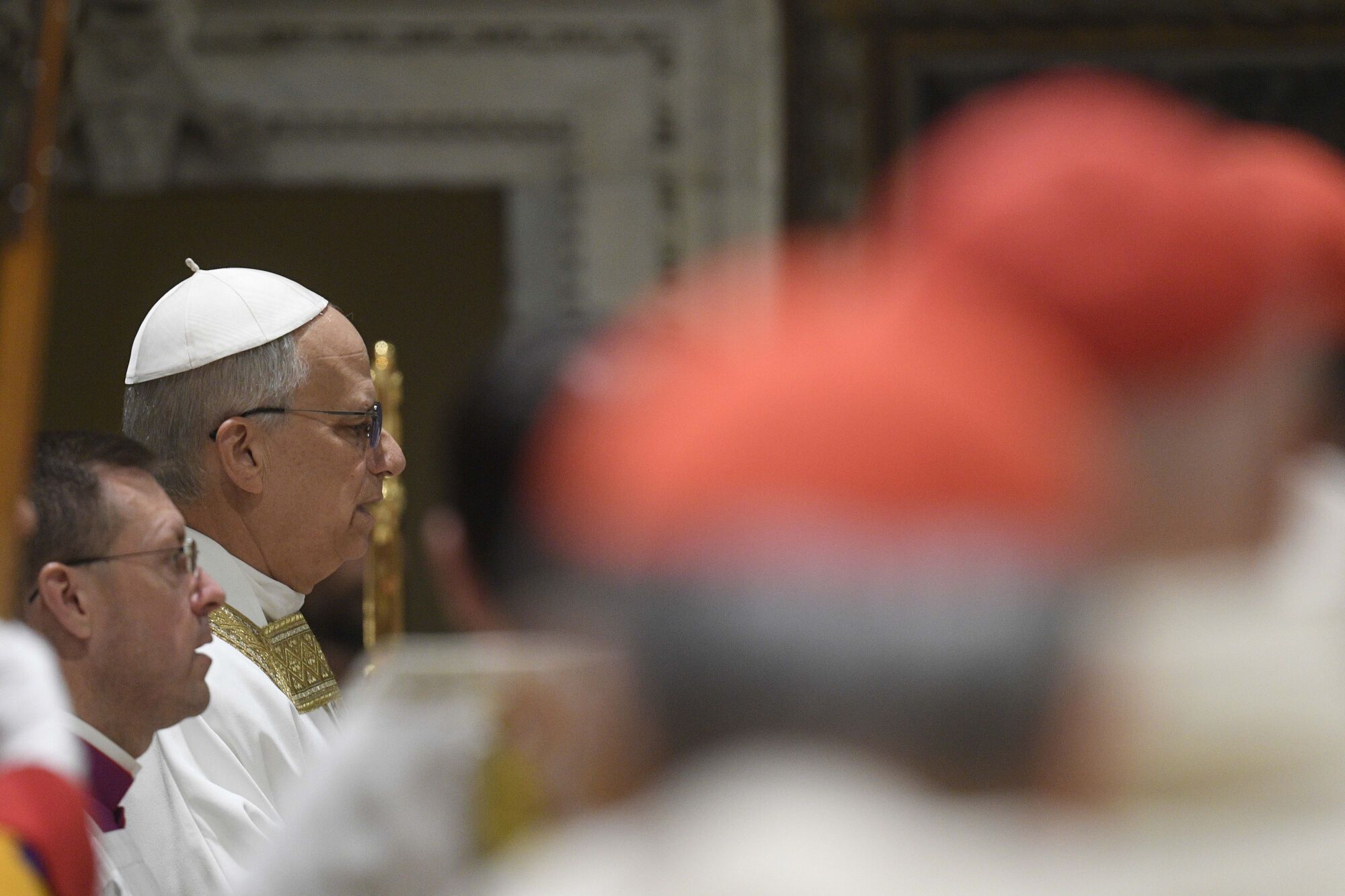 Newly elected Pope Leo XIV, second from left, concelebrates Mass with the College of Cardinals inside the Sistine Chapel at the Vatican the day after his election as 267th pontiff of the Roman Catholic Church, Friday, May 9, 2025. (Vatican Media via AP). AP PROVIDES ACCESS TO THIS GOVERNMENT PRODUCED PHOTO SOLELY TO ILLUSTRATE NEWS REPORTING OR COMMENTARY ON FACTS DEPICTED IN IMAGE; MUST BE USED WITHIN 14 DAYS FROM TRANSMISSION; NO ARCHIVING; NO LICENSING; MANDATORY CREDIT