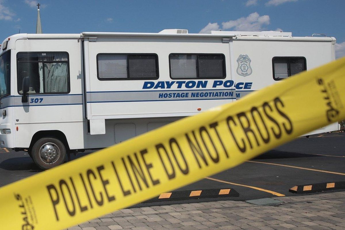 DAYTON  OHIO - AUGUST 04  Police continue their investigation after a mass shooting in a popular nightlife district on August 04  2019 in Dayton  Ohio  At least 9 people were reported to have been killed and another 27 injured when a gunman identified as 24-year-old Connor Betts opened fire with a AR-15 style rifle  The shooting comes less than 24 hours after a gunman in Texas opened fire at a shopping mall killing at least 20 people    Scott Olson Getty Images AFP    FOR NEWSPAPERS  INTERNET  TELCOS   TELEVISION USE ONLY