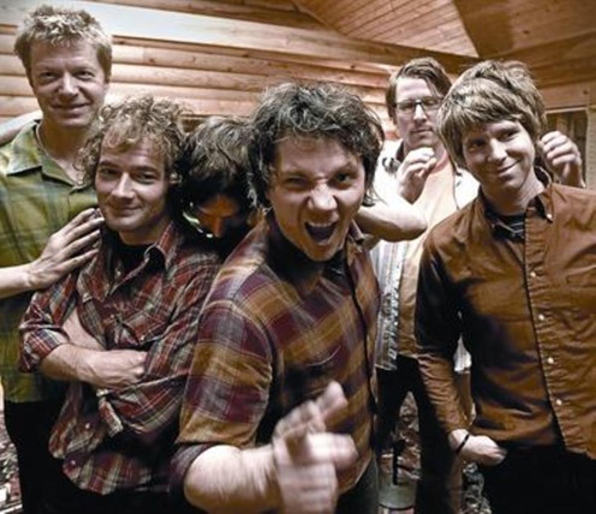 Wilco, en una imatge promocional, amb Nels Cline primer per l’esquerra i Jeff Tweedy al centre.