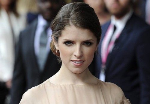 Actress Anna Kendrick poses for photographers as she arrives for the European premiere of 'What to expect when you are Expecting', in London
