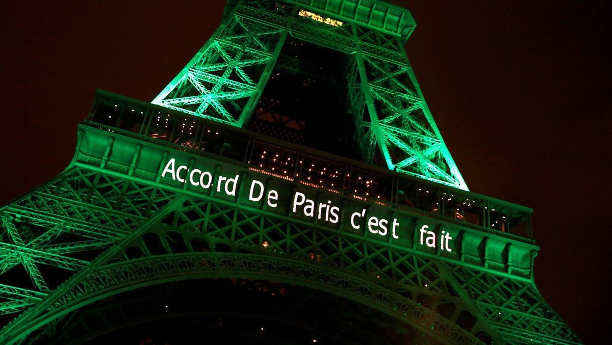 The Eiffel tower is illuminated in green with the words Paris Agreement is Done, to celebrate the Paris U.N. COP21 Climate Change agreement in Paris, France, November 4, 2016. REUTERS/Jacky Naegelen