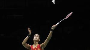 Carolina Marin of Spain plays a shot as she competes against Saina Nehwal of India in their women’s badminton singles quarterfinal match at the BWF World Championships in Nanjing, China, Friday, Aug. 3, 2018. (AP Photo/Mark Schiefelbein)