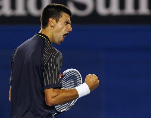 Novak Djokovic of Serbia celebrates winning the second set during his men's singles final match against Andy Murray of Britain at the Australian Open tennis tournament in Melbourne