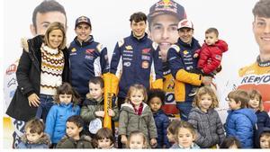 Márquez , Bou y Marcelli, durante el evento en el colegio de Tres Cantos