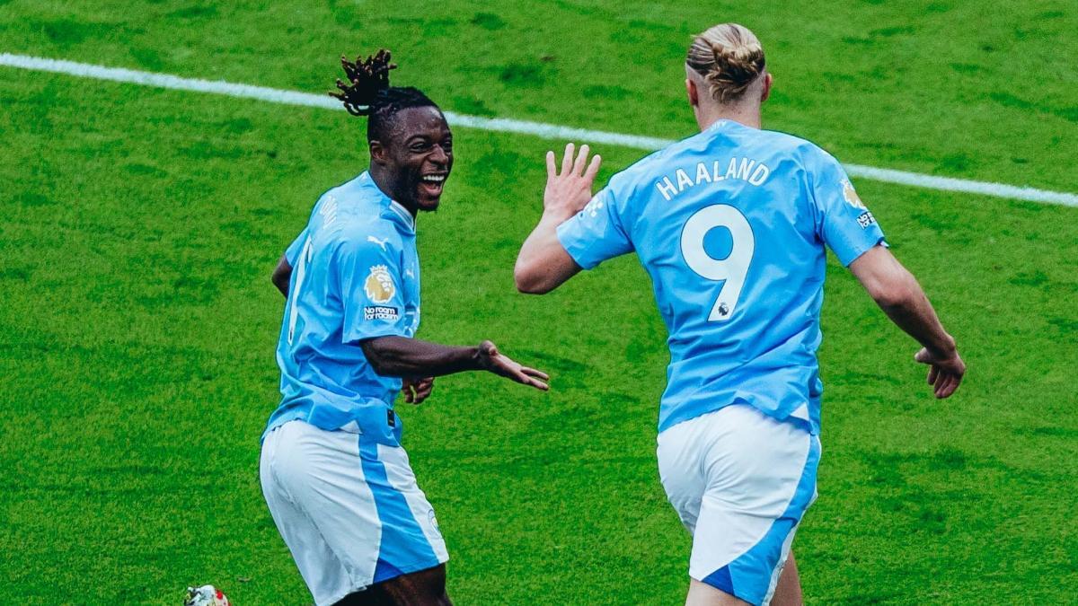 Doku y Haaland, celebrando el gol del noruego