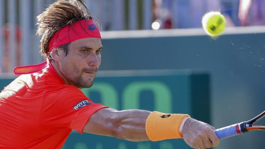 David Ferrer resta un golpe de Simon.