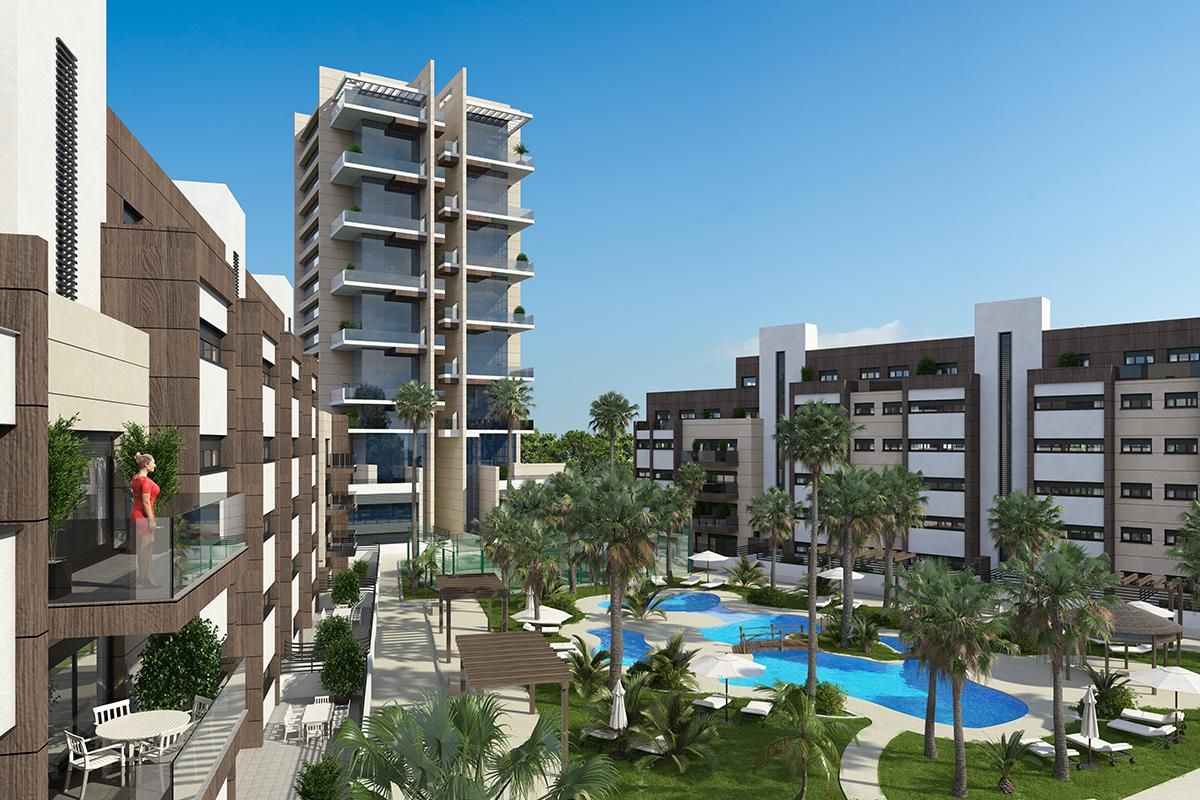 Vista de las zonas comunes ajardinadas de los tres bloques que conforman el residencial al completo
