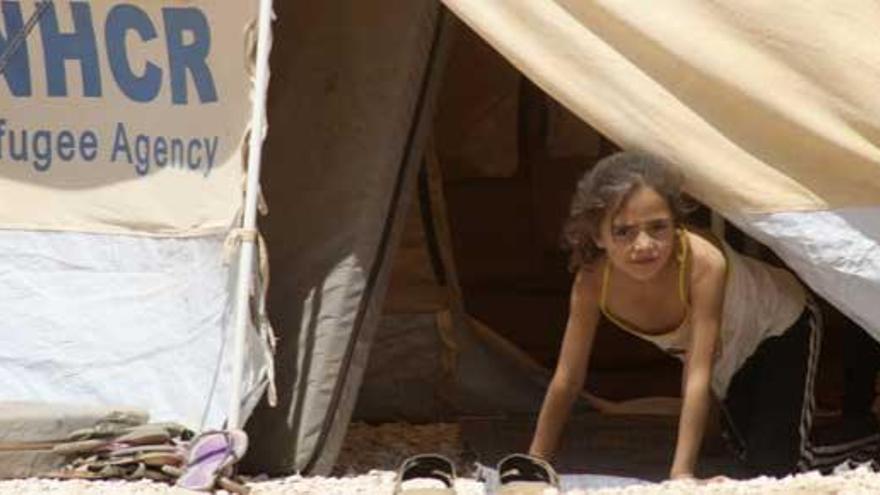 Una niña, en un campo de refugiados sirios en Jordania.