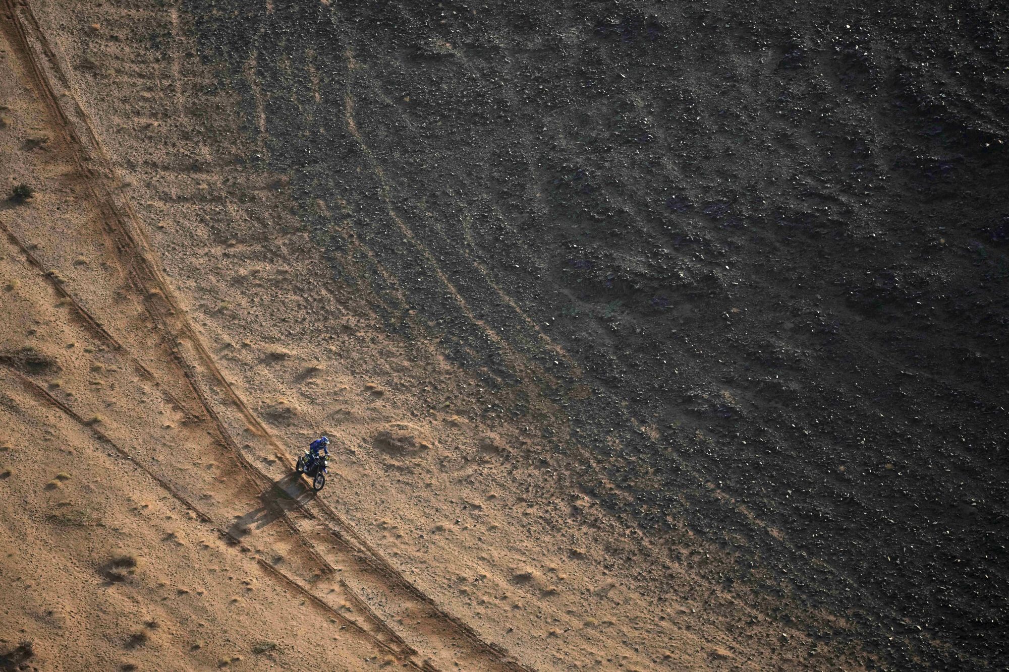 Lorenzo Santolino of Spain rides during the seventh stage of the Dakar Rally with start and finish in Al Duwadimi, Saudi Arabia, Sunday, Jan. 12, 2025. (AP Photo/Christophe Ena). EDITORIAL USE ONLY/ONLY ITALY AND SPAIN