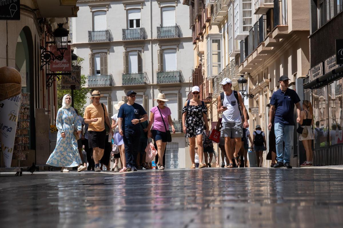 Instantáneas del primer domingo de septiembre en las playas y el centro histórico de Málaga