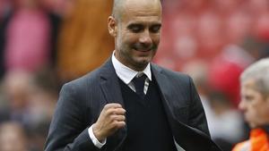 Guardiola celebra el triunfo del City en Old Trafford.