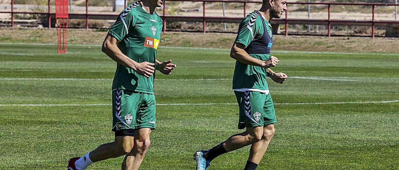 Pere Milla y Óscar Gil, en el último entrenamiento del Elche.