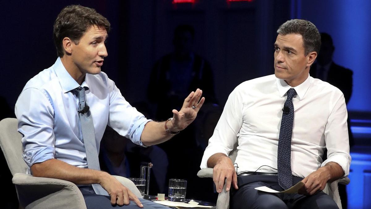 Justin Trudeau y Pedro Sánchez, durante un debate en Montreal.