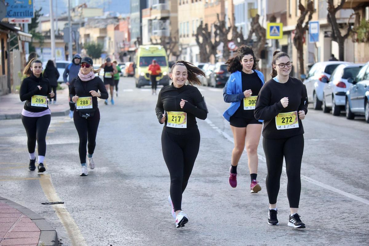 Las imágenes de la carrera popular solidaria en el barrio de El Progreso