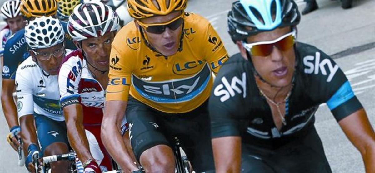 Porte, Froome, Purito i Quintana,en la pujada a Alpe d’Huez, ahir.