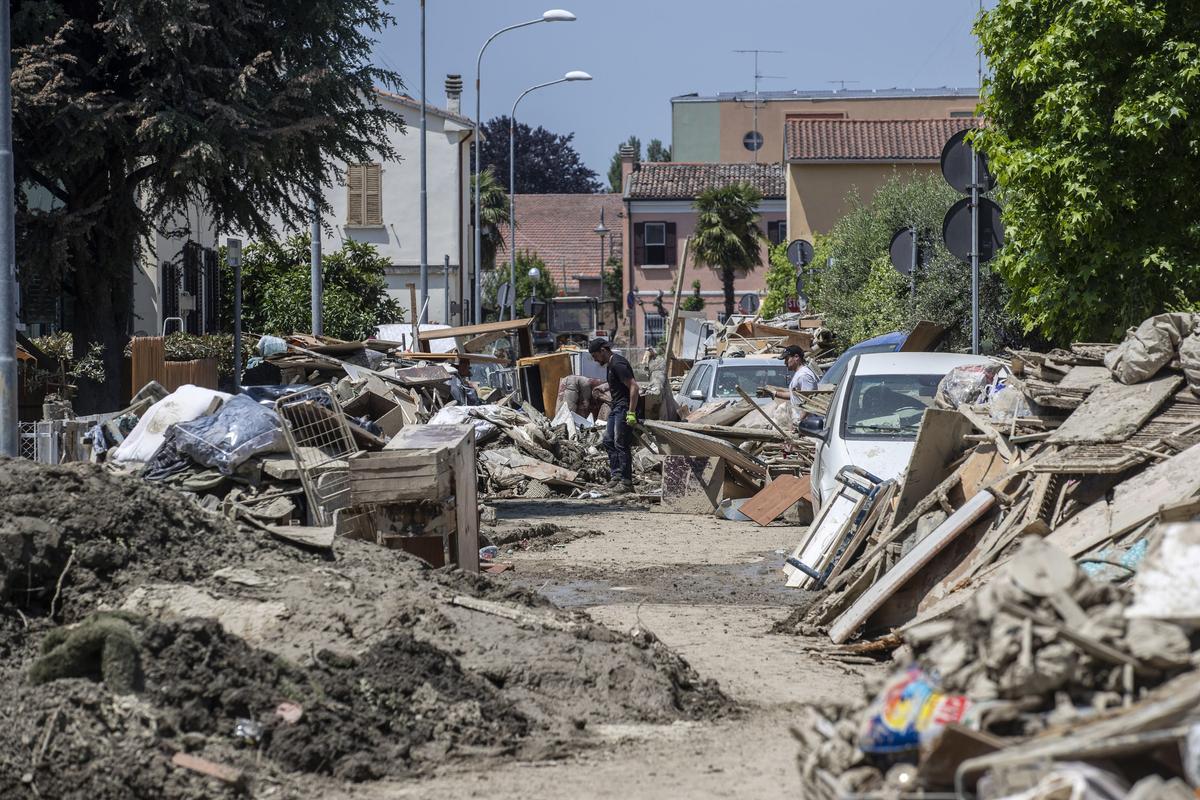 Volunteers clear mud after flooding in Emilia-Romagna region, Italy