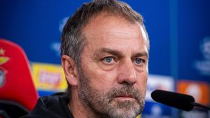 Flick, en la rueda de prensa que ha ofrecido en Lisboa previa al duelo con el Benfica de la Champions.