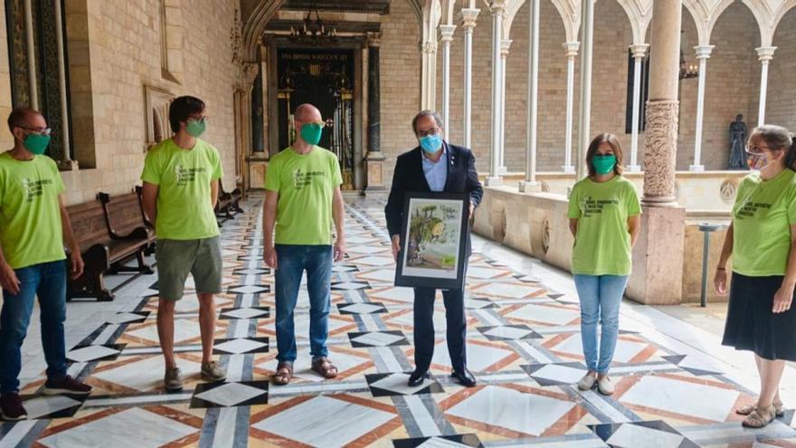 El president de la Generalitat, Quim Torra, i els representants de la plataforma No a la MAT Selva