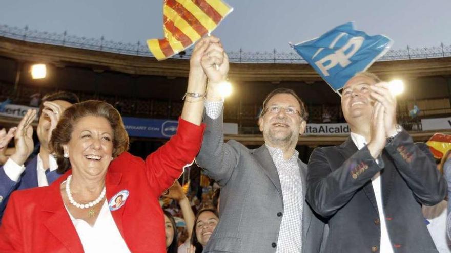 Rita Barberá, Mariano Rajoy y Alberto Fabra, ayer, en Valencia.